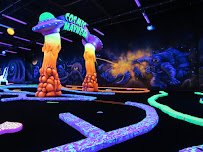 Cosmic Mayhem: Black Light Mini Golf and Bar